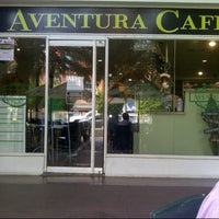 Photo taken at Aventura Cafe by Ensitu B. on 12/28/2012