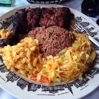 Photo taken at Caribbean Feast Cuisine by Lauryn A. on 8/22/2014
