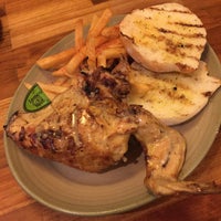 Photo taken at Nando&amp;#39;s by Ayessa M. on 4/19/2015
