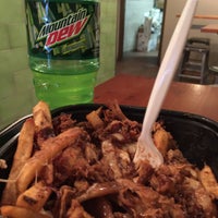 Photo taken at POUTINE Dare To Be Fresh! by Tanner L. on 3/10/2015