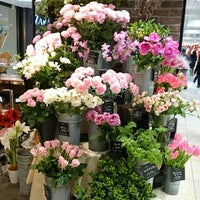 Photo taken at Aoyama Flower Market by Toshi Y. on 1/9/2016