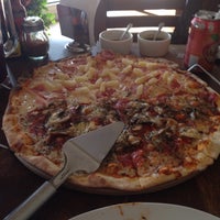 Photo taken at Buruz Pizza &amp; Vino by Alexis A. on 6/28/2014