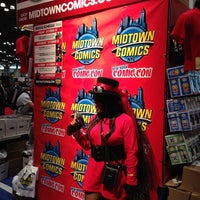 Photo taken at Midtown Comics @ NYCC Booth 1638 by Thor P. on 10/11/2012