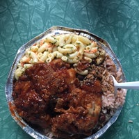 Photo taken at JJ&amp;#39;s Jamaican Restaurant by Brian R. on 6/28/2015
