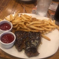 Photo taken at Outback Steakhouse by Sean F. on 12/27/2019