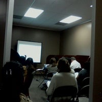 Photo taken at REALM Real Estate Professionals by Vanessa C. on 1/19/2012