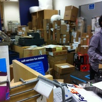 Photo taken at FedEx Office Print &amp; Ship Center by Rye R. on 11/24/2012