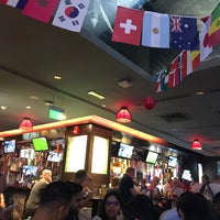 Photo taken at The Huddle Sports Bar &amp;amp; Grill by KL on 7/7/2018