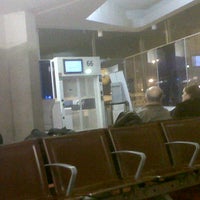 Photo taken at Gate 66 by Xavier T. on 1/28/2013