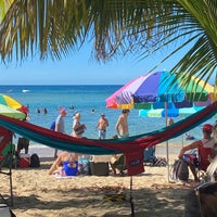 Photo taken at Playa Jobos by Christian M. on 1/23/2022