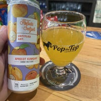 Photo taken at Pop the Top Craft Beer Shop by Dan K. on 8/5/2022