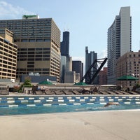 Photo taken at East Bank Club Pool Deck by Heather W. on 7/17/2014