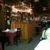 Photo taken at La Porteña Restaurant by Howard K. on 9/25/2012