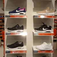 Photo taken at Nike Factory Store by Emma S. on 7/29/2018