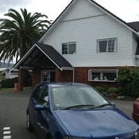 Photo taken at Asure Palm Court Rotorua by Vladimir P. on 1/3/2013