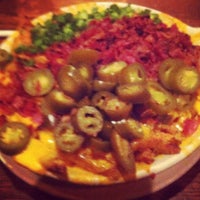 Photo taken at Snuffers by Nikki S. on 12/9/2012
