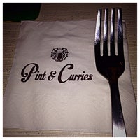 Photo taken at Pint &amp;amp; Curries by Mabel T. on 1/10/2015
