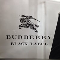 Photo taken at BURBERRY BLACK LABEL 渋谷店 by Shiqiang L. on 1/4/2014
