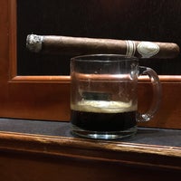 Photo taken at The Cigar Inn by Aristippos on 12/19/2019