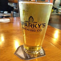 Photo taken at Sparky&amp;#39;s Brewing Company by Kate D. on 5/26/2018