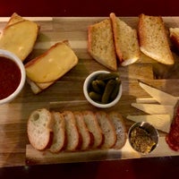 Photo taken at Cure Seattle | Capitol Hill Bar &amp;amp; Charcuterie by Jen W. on 2/23/2019