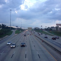 Photo taken at I-10 pedestrian overpass by Kyle J. on 7/14/2014