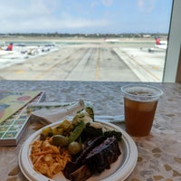 Photo taken at Delta Sky Club by Taylor M. on 8/18/2022