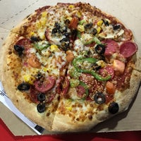 Photo taken at Domino&amp;#39;s Pizza by Serkan B. on 1/7/2018