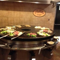 Photo taken at bd&amp;#39;s Mongolian Grill by Courtenay O. on 11/15/2012