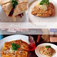 Photo taken at aTavoLa Italian Gourment &amp;amp; Resto by Barbara Y. on 5/15/2014