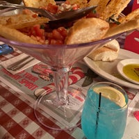 Photo taken at Buca di Beppo by Kaitlyn H. on 9/30/2022