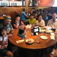 Photo taken at Outback Steakhouse by Lucy Y. on 6/10/2018