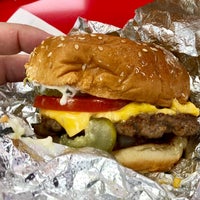 Photo taken at Five Guys by Nares V. on 3/18/2018