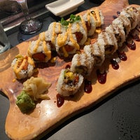 Photo taken at Okura Robata Sushi Bar and Grill by Katlyn B. on 6/2/2021