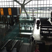 Photo taken at Terminal 5 by Sergio R. on 5/13/2013