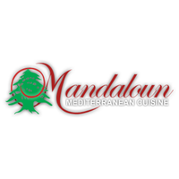 Photo taken at Mandaloun Mediterranean Cuisine by Mandaloun Mediterranean Cuisine on 8/12/2015