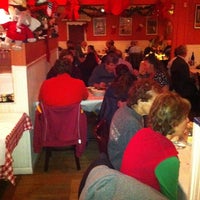 Photo taken at Augie&amp;#39;s Family Style Italian Restaurant by Ron B. on 12/19/2012
