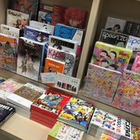 Photo taken at Kinokuniya Book Store by Fa M. on 7/23/2016