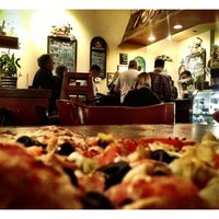 Photo taken at Mogio&amp;#39;s Gourmet Pizza by Ken O. on 1/19/2013
