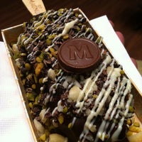 Photo taken at Magnum Store by Nelson R. on 10/28/2012