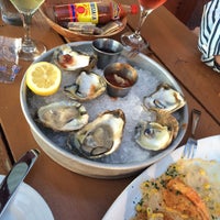 Photo taken at Coast Seafood &amp;amp; Raw Bar by Pelin K. on 9/18/2015