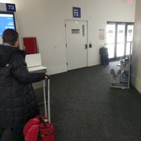 Photo taken at Gate 73 by Cyrus H. on 12/25/2017