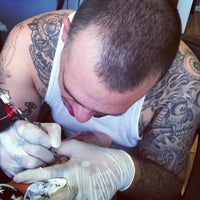 Photo taken at Tattoo Lab by Krystle S. on 5/27/2013