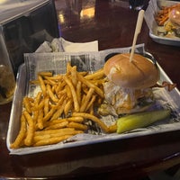 Photo taken at Over The Top Burger Bar by R T. on 2/1/2024