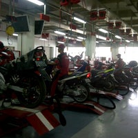 Photo taken at Yamaha Flagship Shop Jakarta by Alponso P. on 12/22/2012