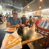 Foto diambil di Front Street Pizza oleh Aniket M. pada 6/26/2022