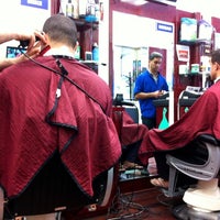 Photo taken at Manhattan Barber Shop by Tony C. on 9/14/2012