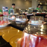 Photo taken at Sushi Train by Russell S. on 7/20/2014