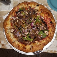 Photo taken at Village Pizza by Ian H. on 2/14/2019