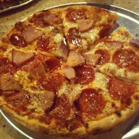 Photo taken at Theo&amp;#39;s Neighborhood Pizza by M.J. L. on 2/12/2013